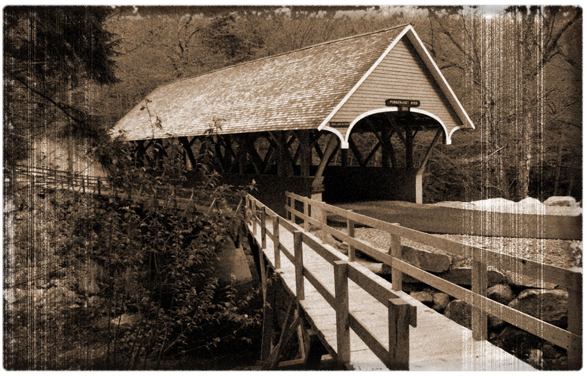 Aged photo of a covered bridge in New Hampshire