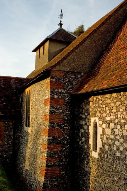 Low sun illuminates St Nicholas Church
